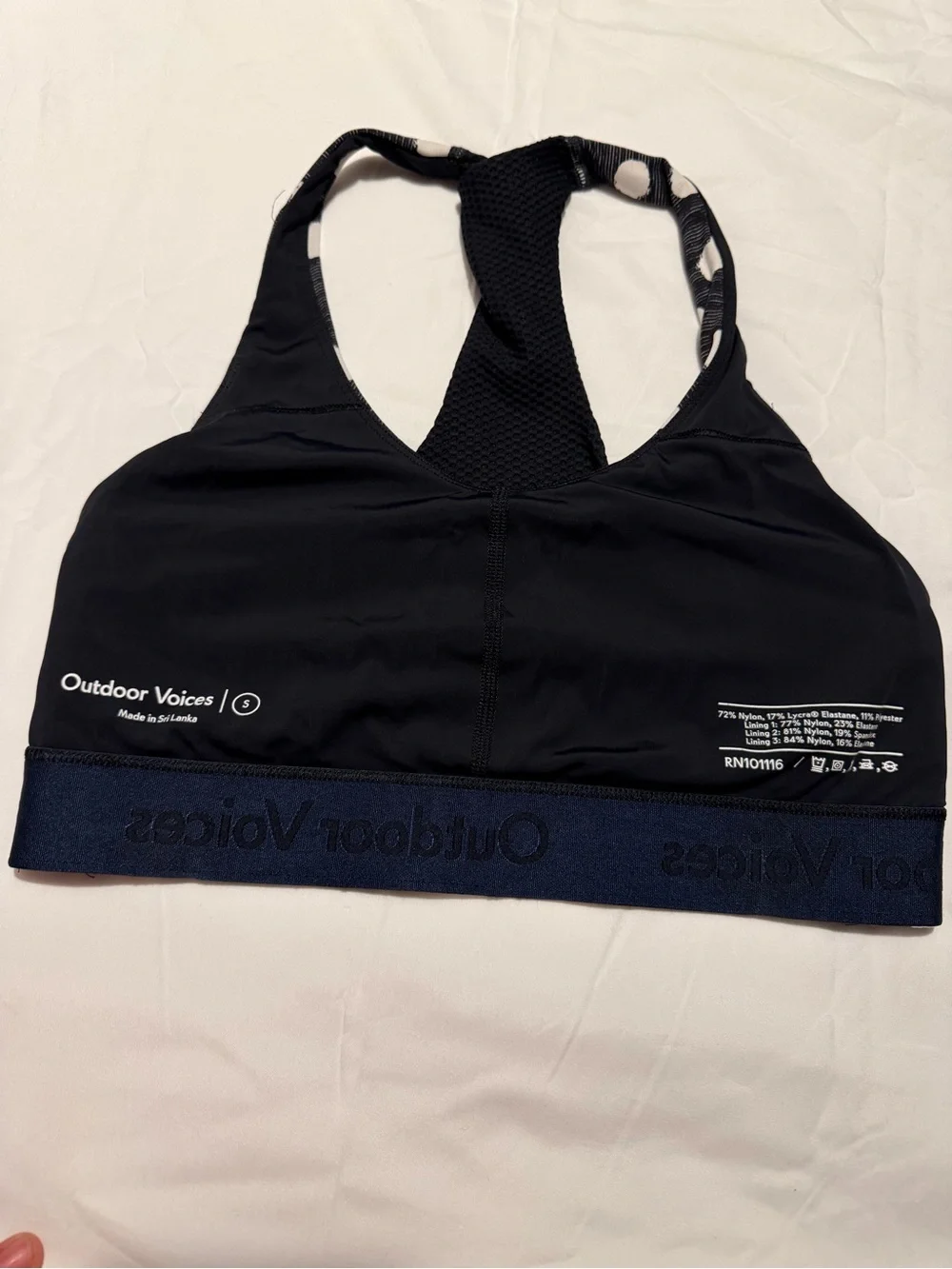 Women’s Racerback Sports Bra - Black & White Polka Dot